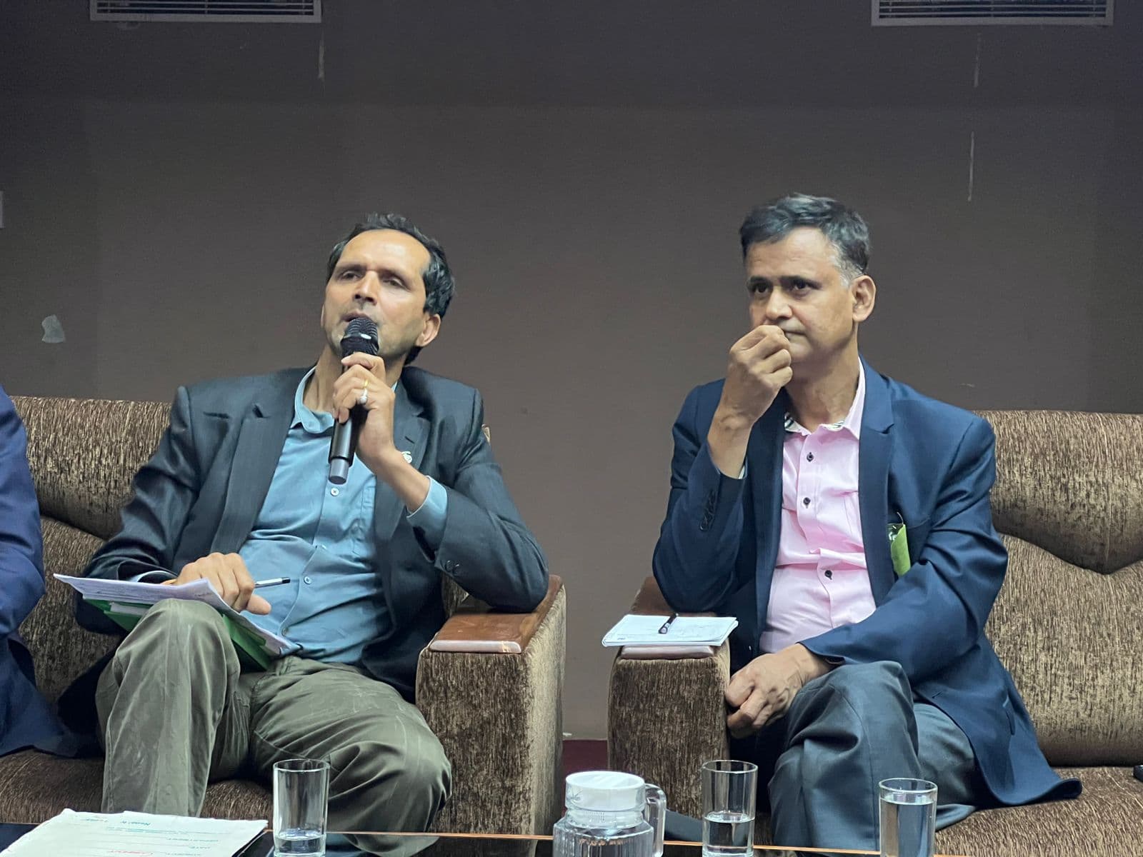 Two speakers participate in a session at the UNITED FOR MOUNTAINS conference.