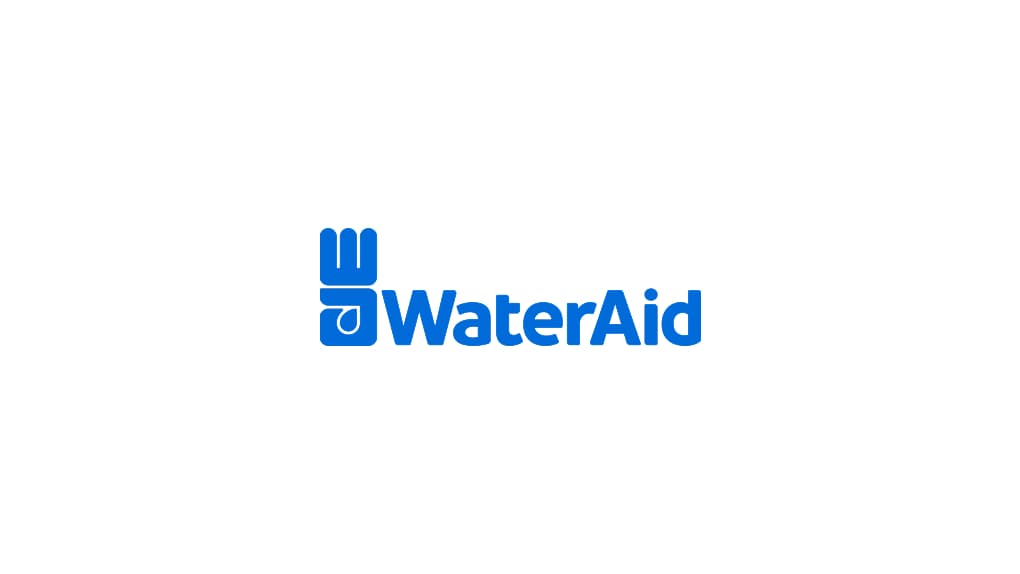 The logo for WaterAid, featuring a blue graphic of a hand holding a water droplet, next to the word "WaterAid" in blue text.